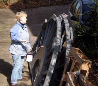 Susan applies some finishing touches.